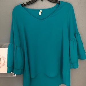 tyche turquoise blouse